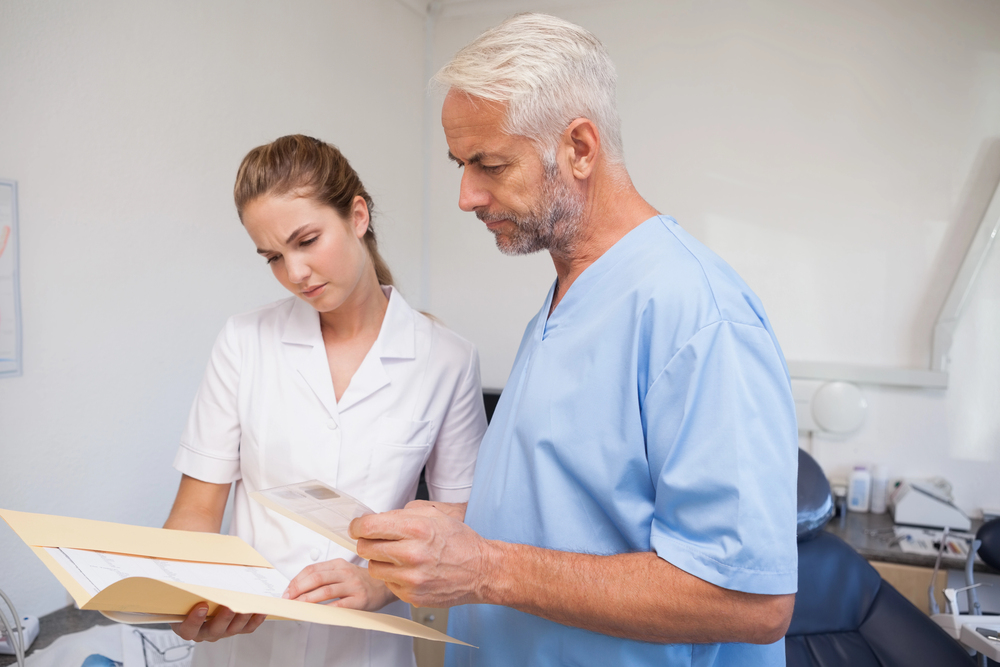 dentist delegating to a staff member
