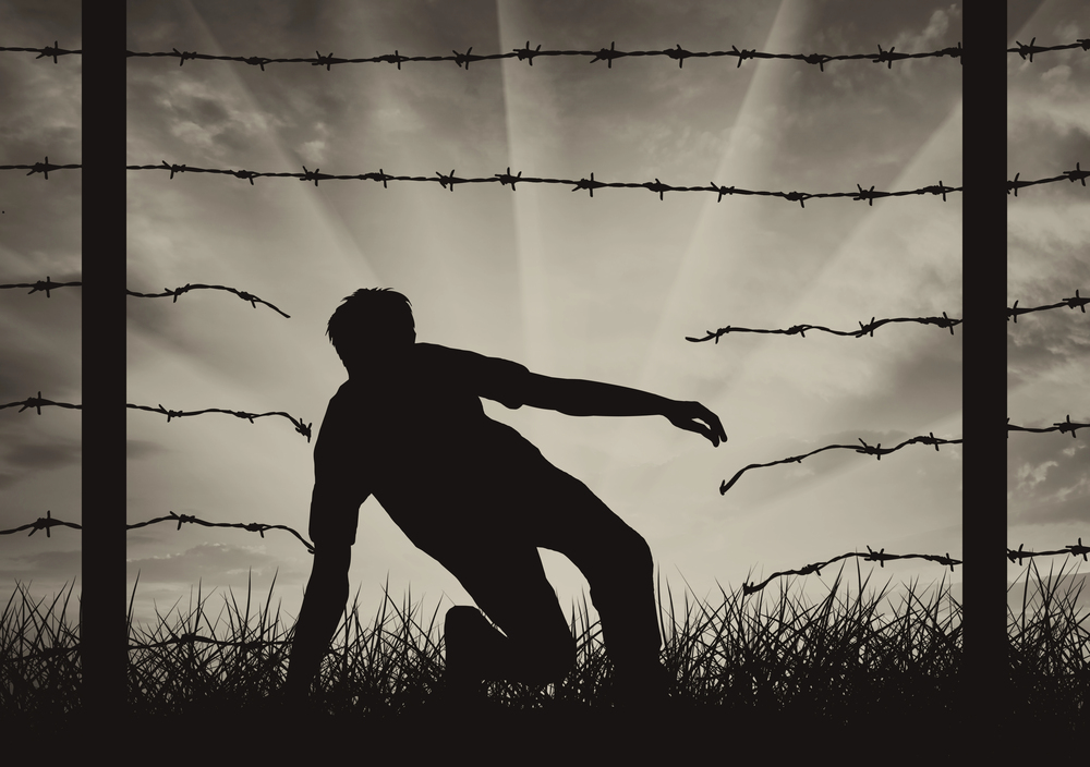 man illegally breaching a border